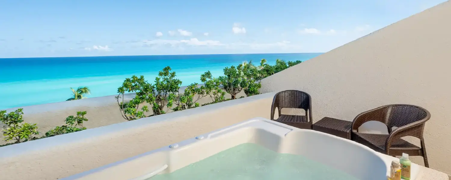 room with ocean view and jacuzzi in the terrace. enjoy stunning and romantic views.