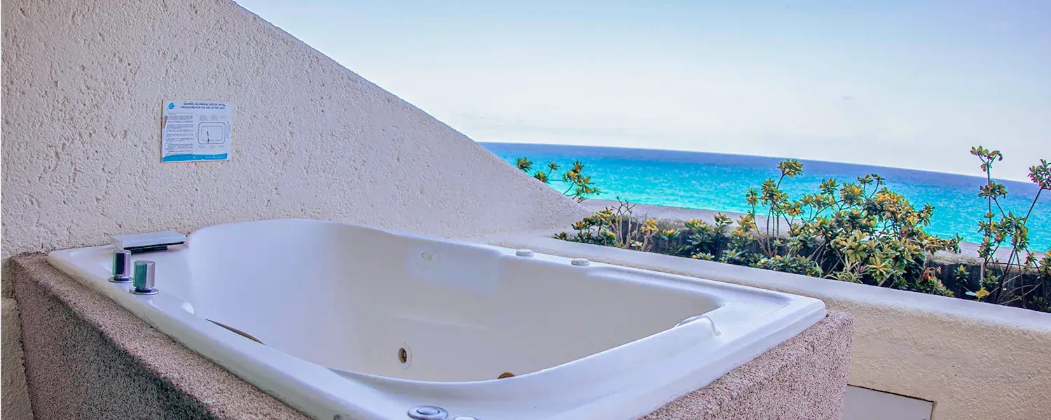 room with ocean view and jacuzzi in the terrace. enjoy stunning and romantic views.